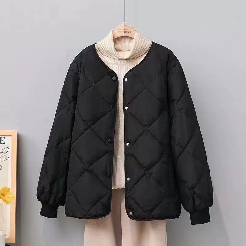 Short quilted women's jacket with round neck
