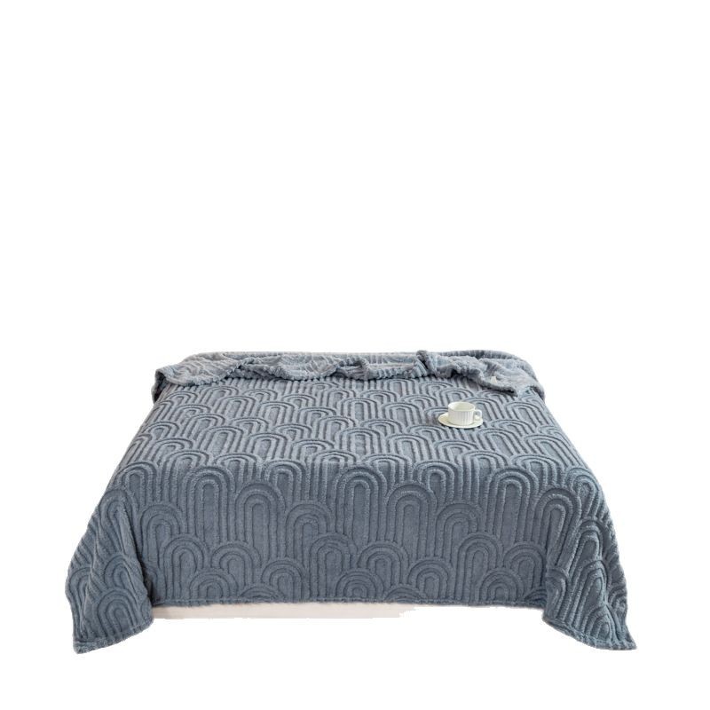 Padded throw blanket with jacquard pattern