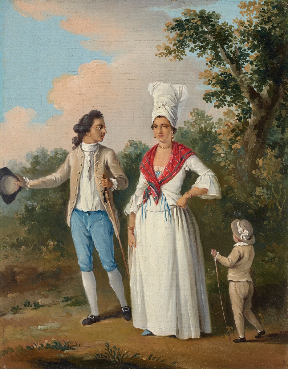 A young couple and child promenading Dominica