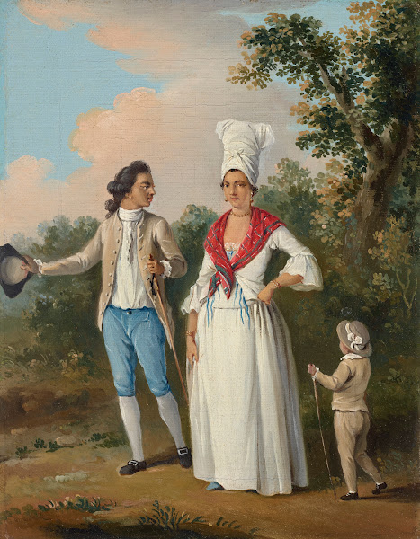 A young couple and child promenading Dominica