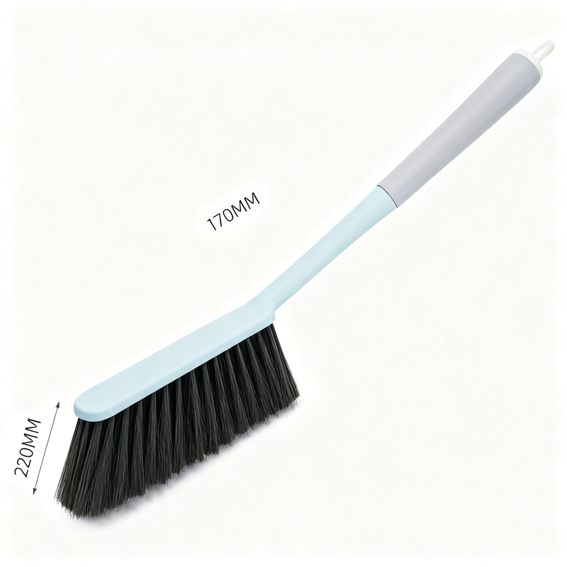 Bed brush with long handle, soft bristles