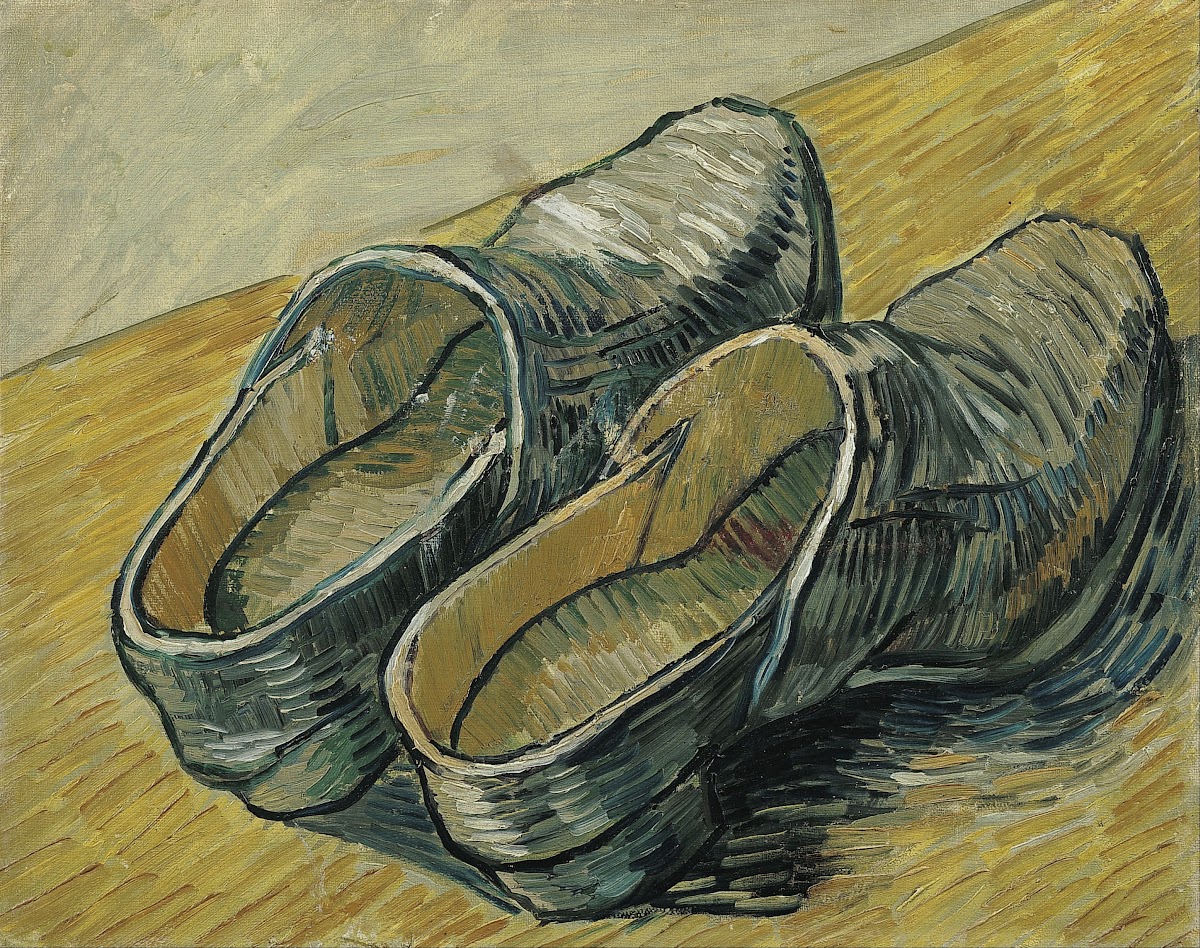 A pair of leather clogs 1888