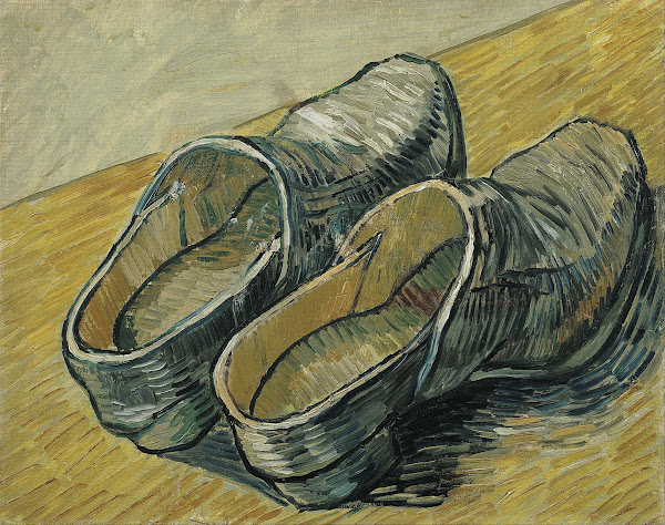 A pair of leather clogs 1888