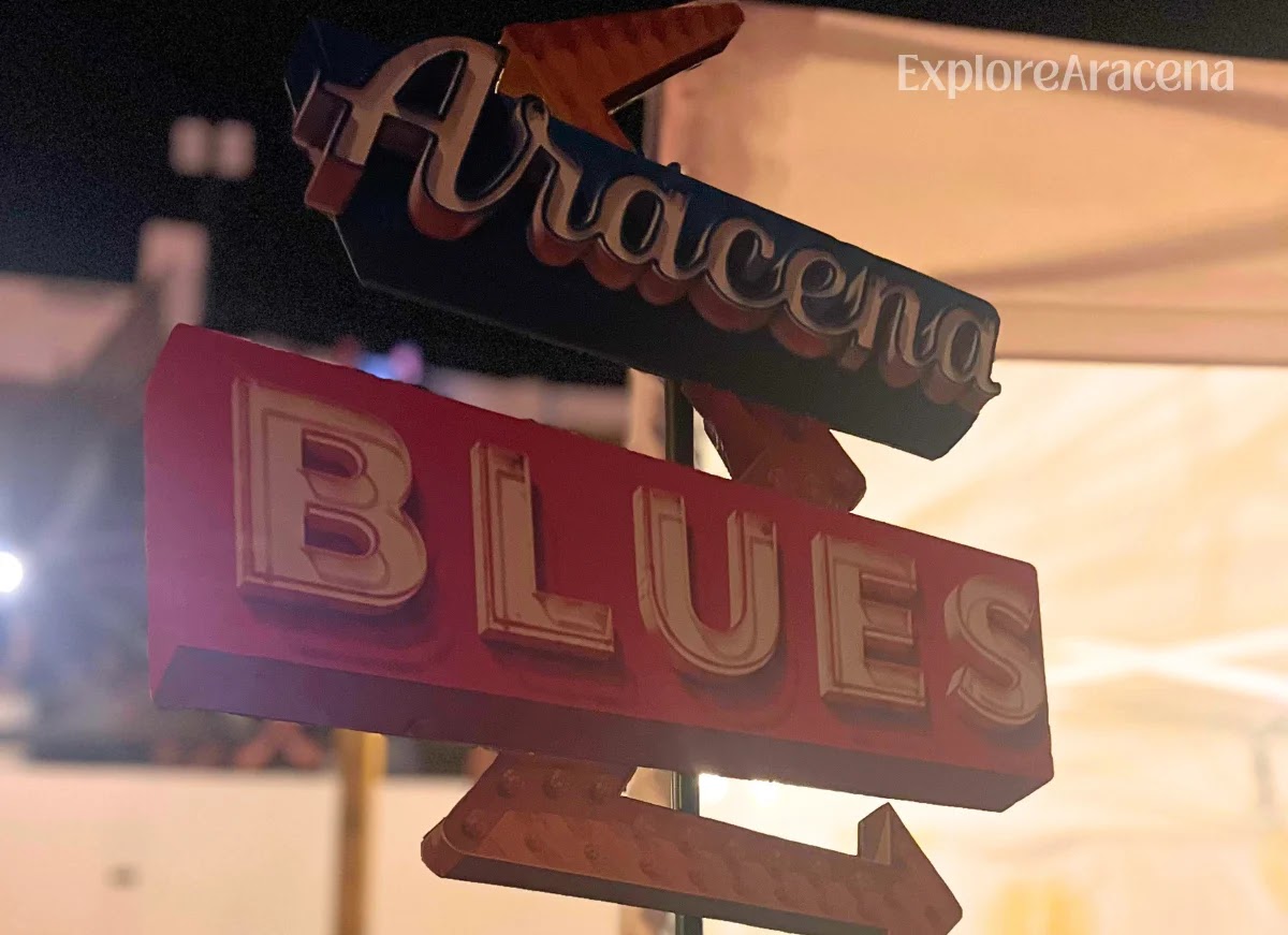 Illuminated Aracena Blues sign displayed during the 2026 festival.