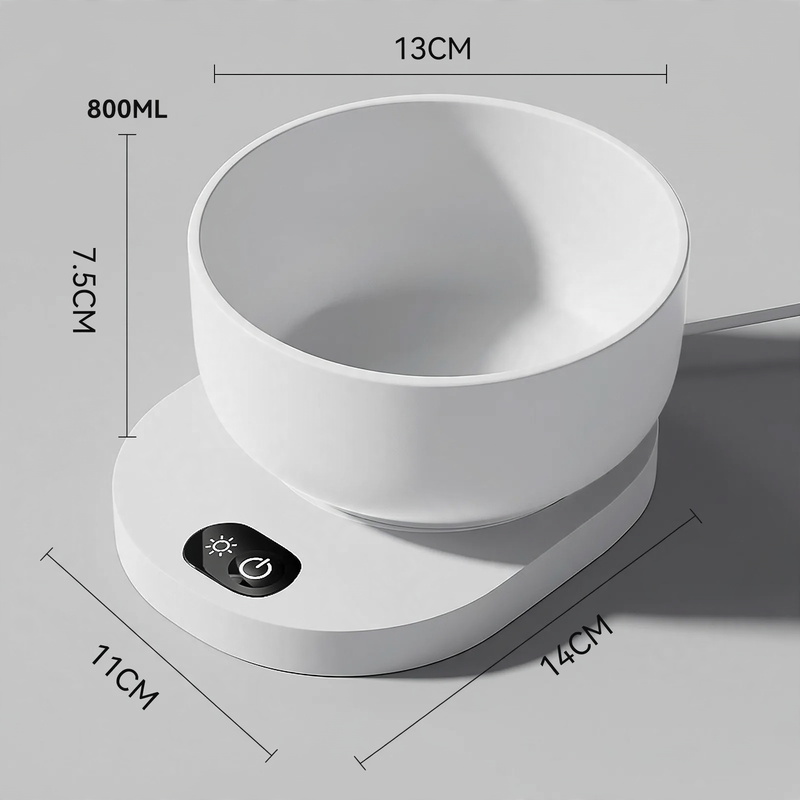 Heated drinking and feeding bowl for pets