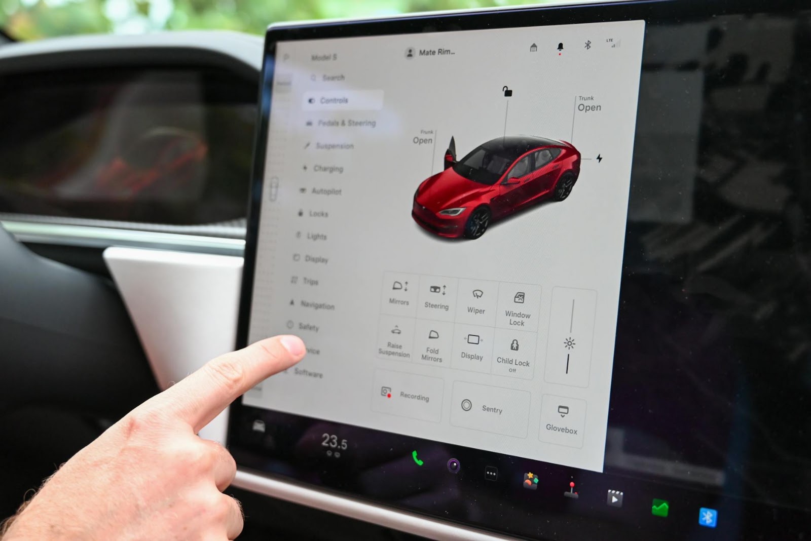 A person confidently interacting with and managing their smart home devices, symbolizing empowered smart home adoption and user control.