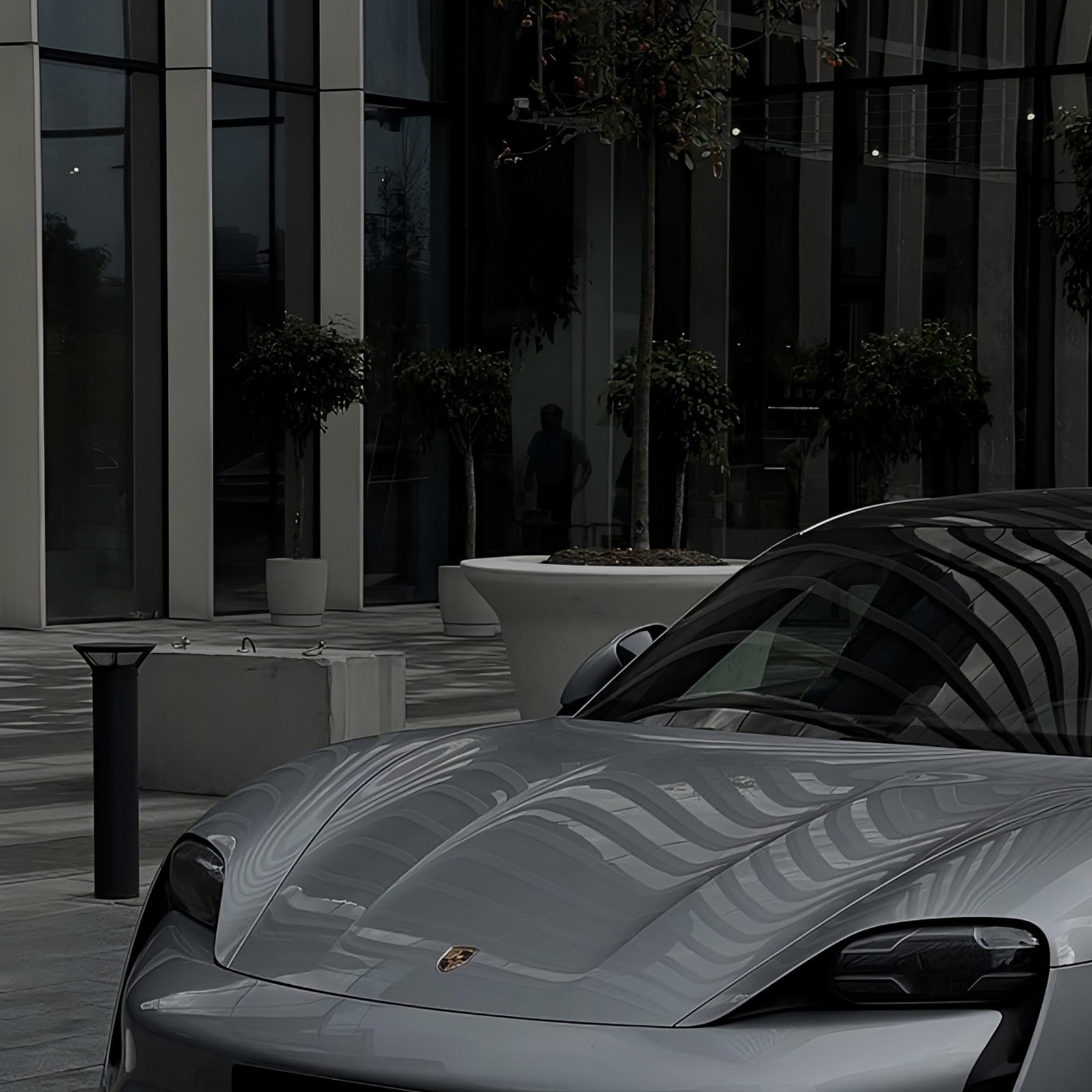 Download Silver Porsche Taycan in City Full HD iPhone