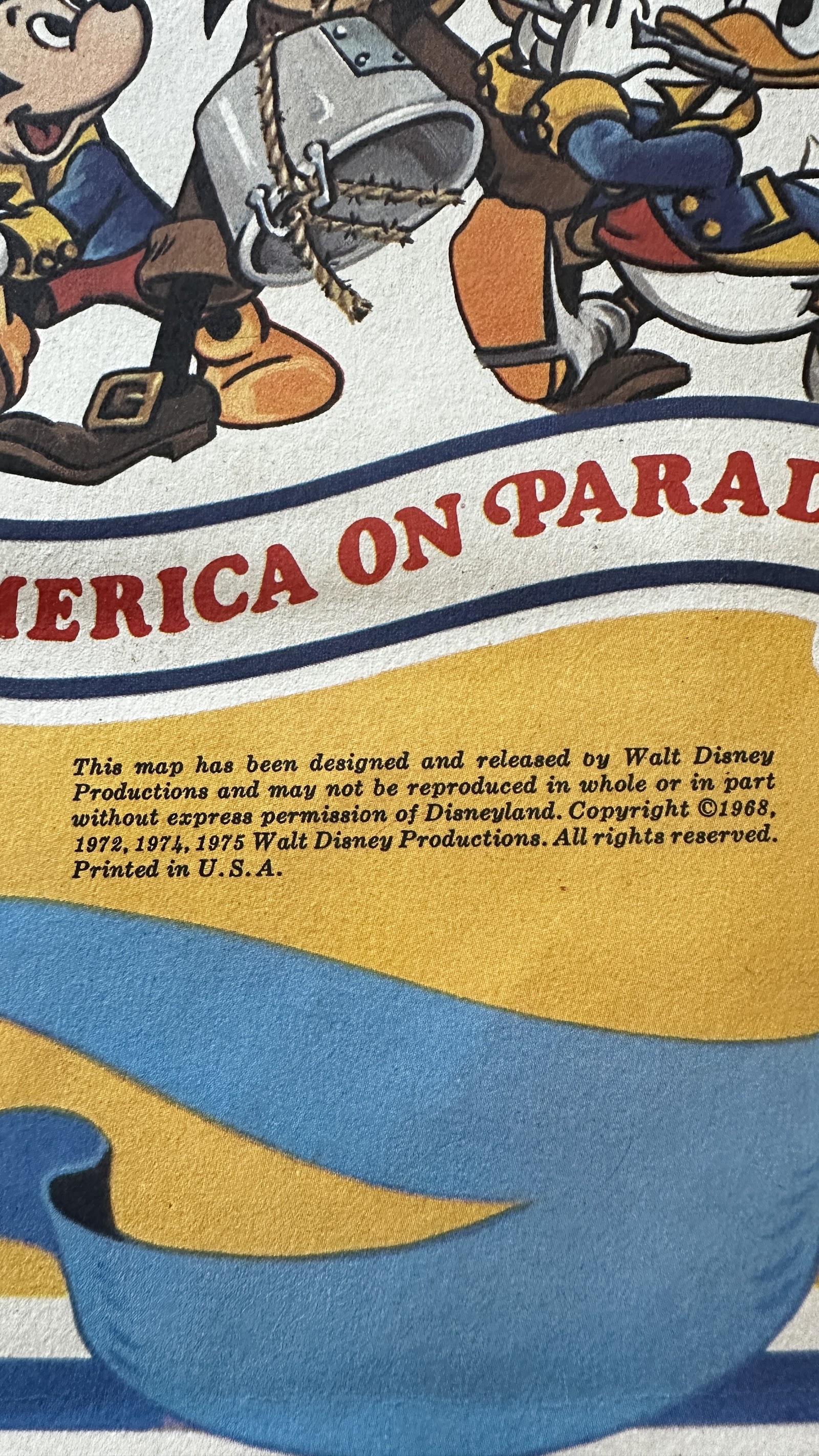 1975 Disneyland America on Parade large-format souvenir map showing Mickey Mouse and Donald Duck in Revolutionary War costumes in a Spirit of '76 pose, red white and blue patriotic design