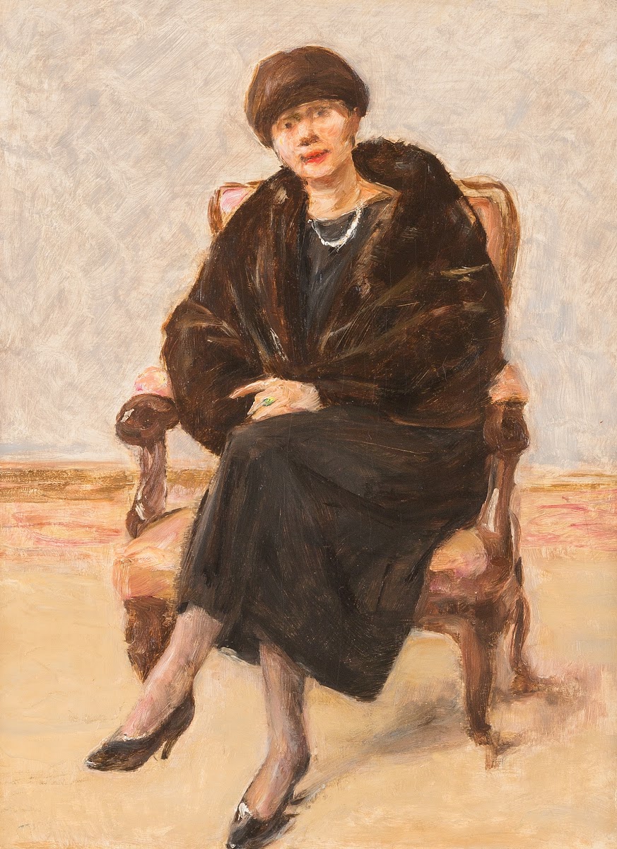 Portrait of Lola Leder in fur coat sitting 1922
