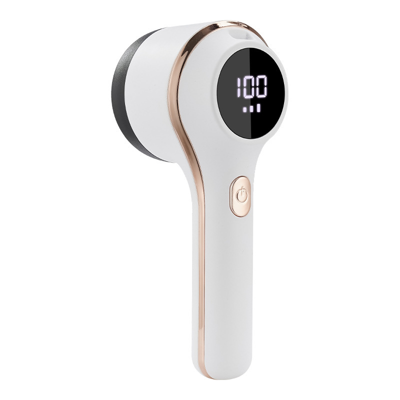 Portable battery-operated lint remover with display