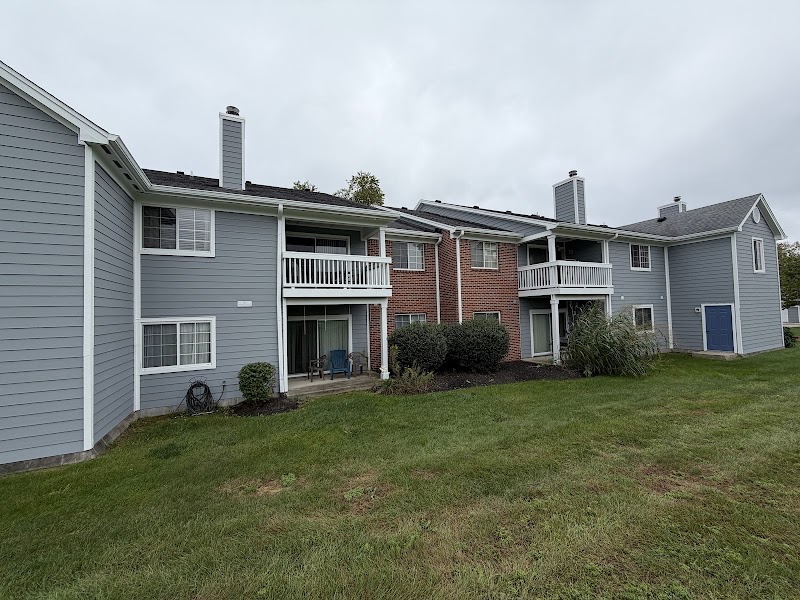 Row of Hidden Creek Condominiums buildings after the coordinated color change, gray siding and white trim