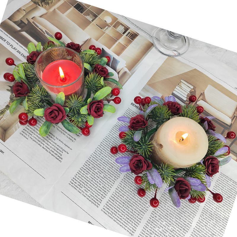 Christmas candle wreath with roses and pine needles