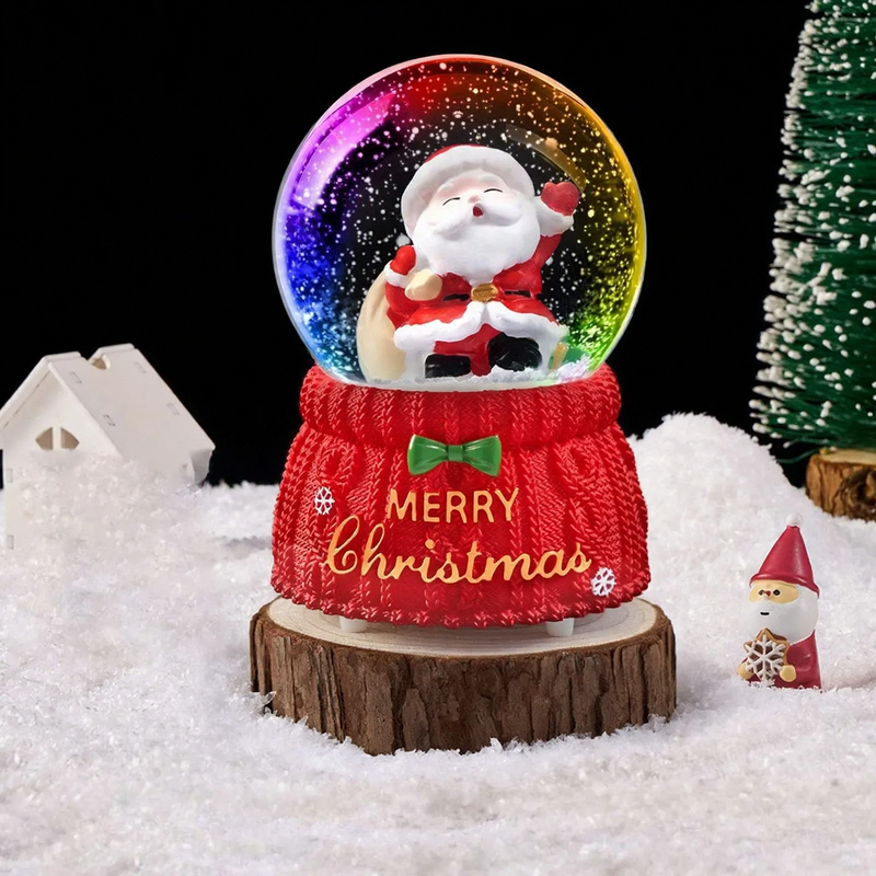 Christmas snow globe with light and music