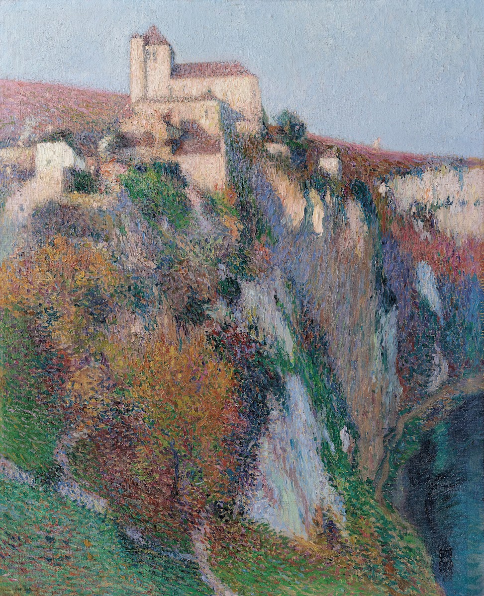 Léglise Saint Cirq Lapopie perchée sur la falaise de la boucle du Lot ciel bleu