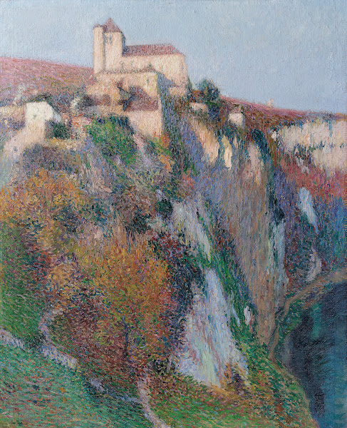 Léglise Saint Cirq Lapopie perchée sur la falaise de la boucle du Lot ciel bleu