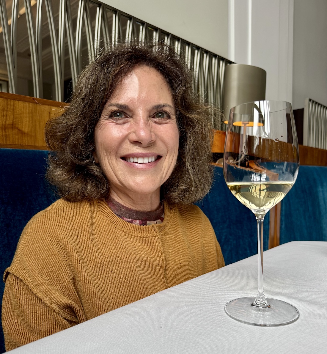 Dvora enjoying wine at Eleven Madison Park