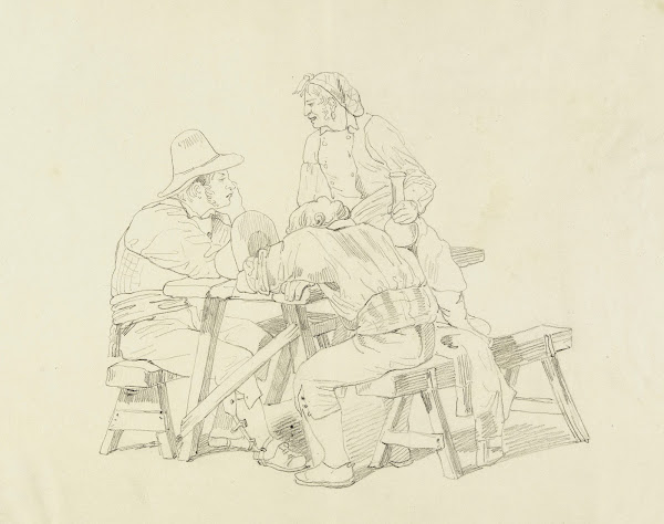 Trois hommes assis à une table