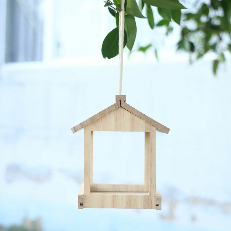 Hanging wooden birdhouse with feeding station