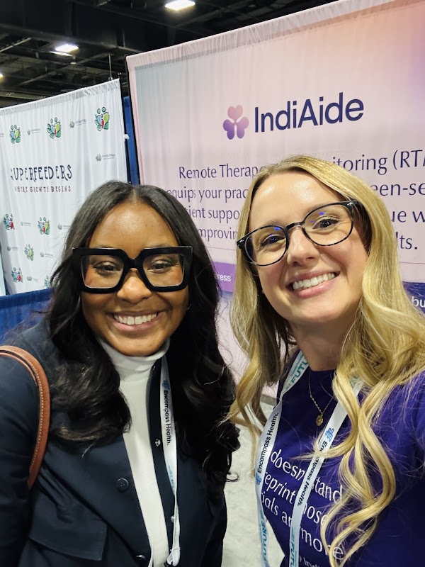 IndiAide team at an event