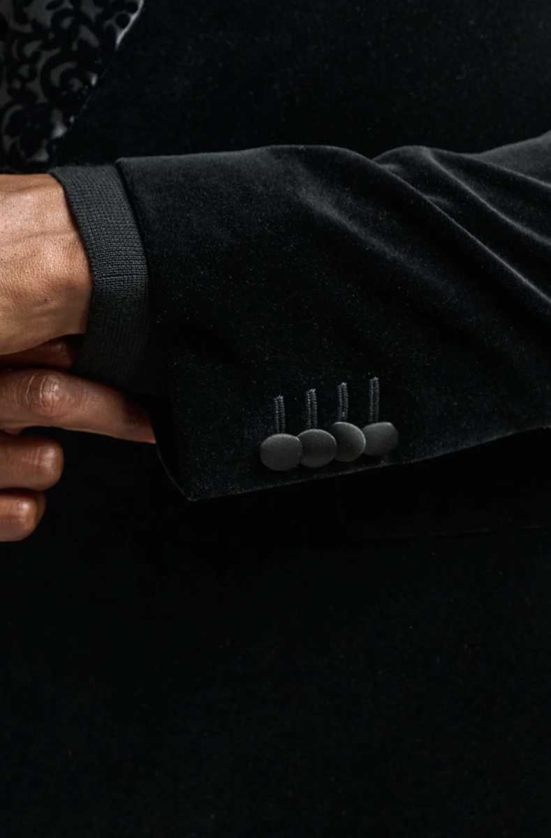 Close-up of black velvet jacket sleeve with velvet-covered surgeon cuff buttons — bespoke detail by Bespoke By CB Miami