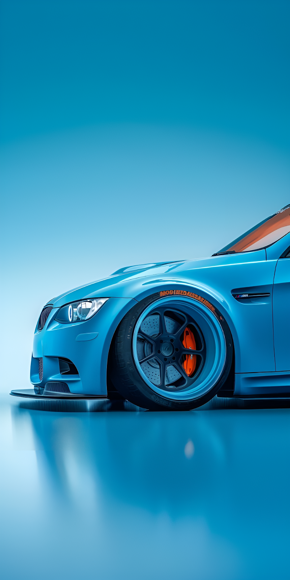 Sleek Blue Sports Car with Orange Brake Calipers on Gradient - Free 4K mobile Wallpaper