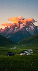 Sunset Camping in Alpine Meadow with Orange Lit Peaks