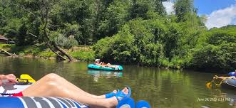 Summer tubing on the river in Ellijay, Georgia near Orchard & Vine Mountain Haus