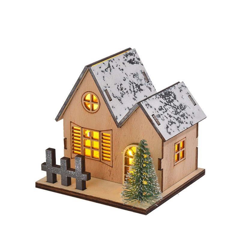 Illuminated Christmas wooden house in Scandinavian style