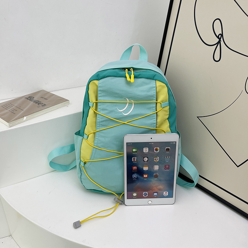 Nylon backpack, 20–35 L, with letter pattern