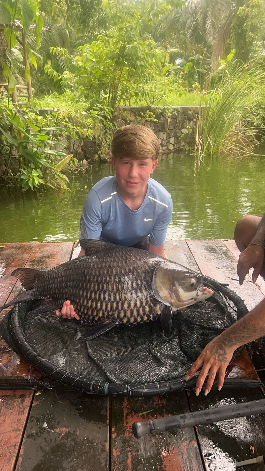 Sol Rogers with a large Siamese Carp at Monster Fishing Thailand