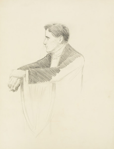 A young man in a suit and bowtie