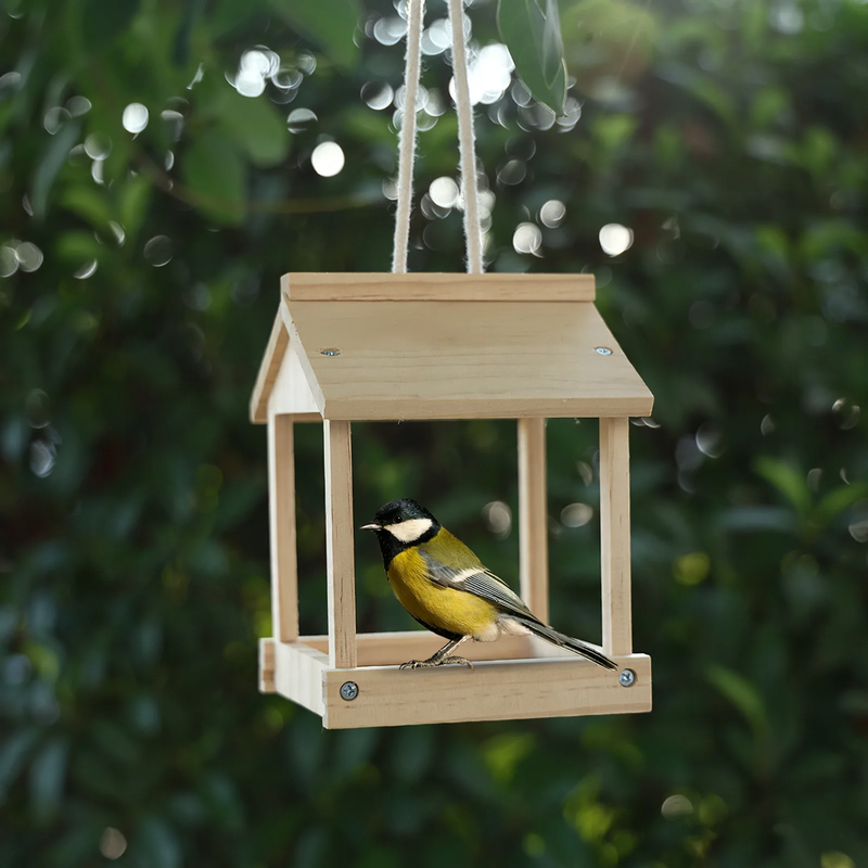 Hanging wooden birdhouse with feeding station