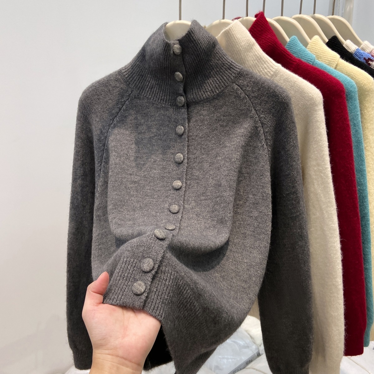 Women's cardigan with stand collar and button placket