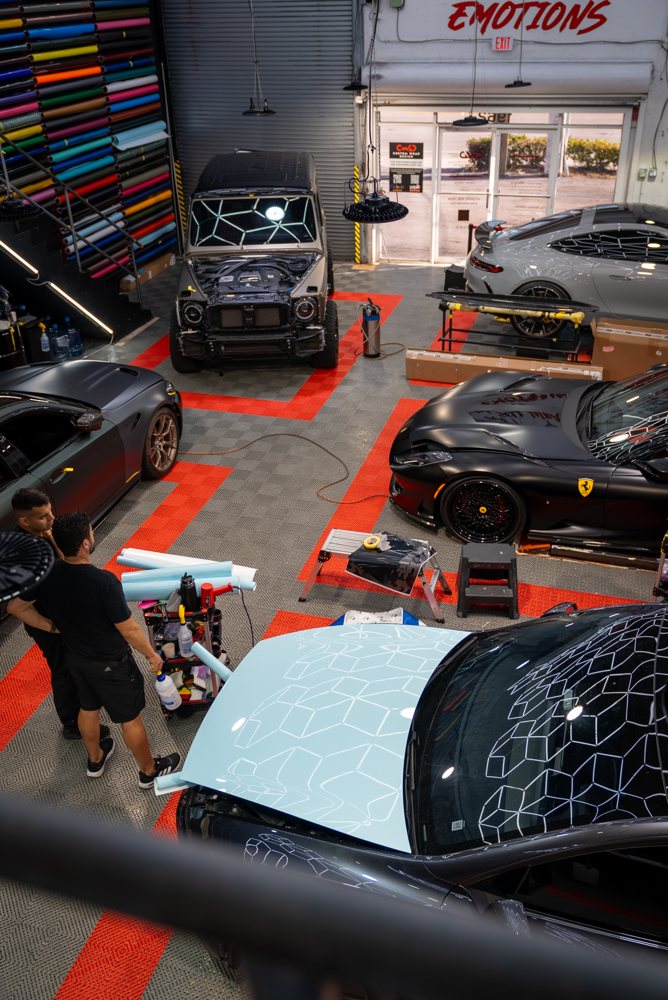 Busy day at the CWD shop with full install bays — Custom Wrap Design Miami