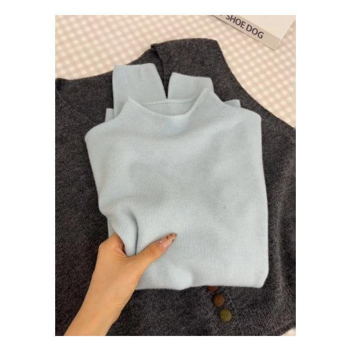 Women's knitted pullover, stand-up collar, simple design