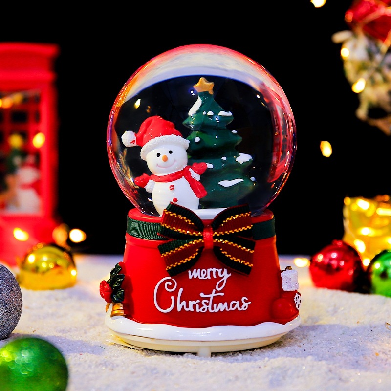 Weihnachtliche Schneekugel mit Musik und Licht