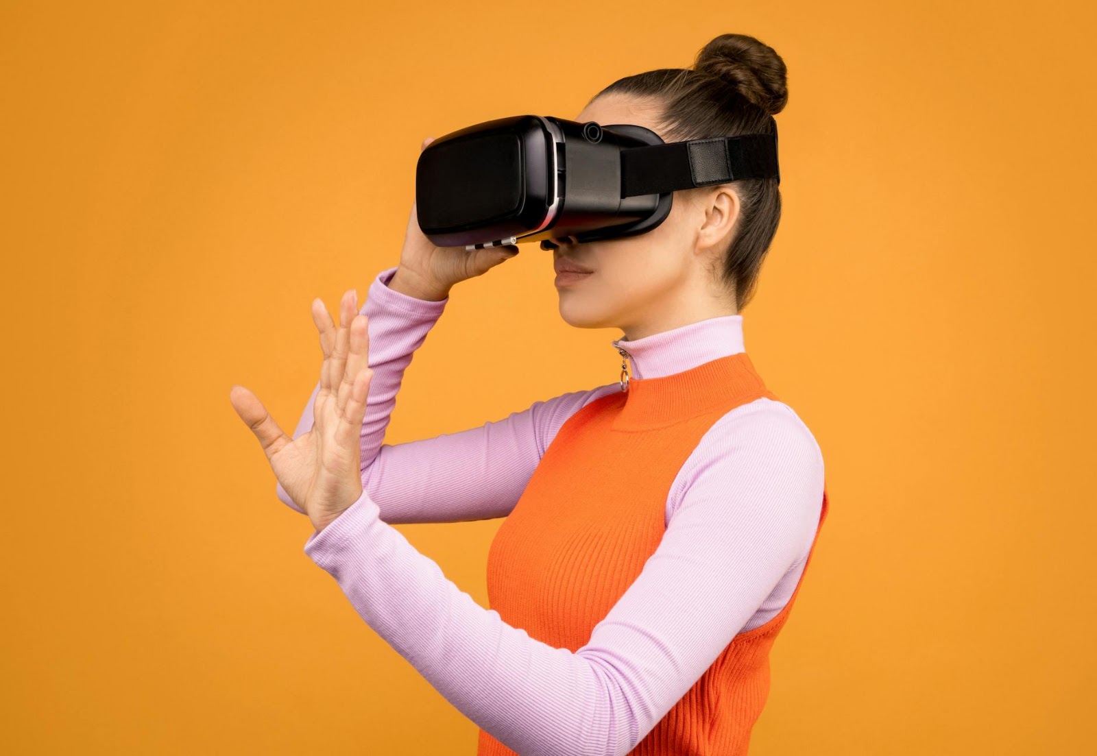 A woman confidently interacting with an augmented reality mirror, trying on a virtual outfit, highlighting the personalized experience of AI virtual try-on.