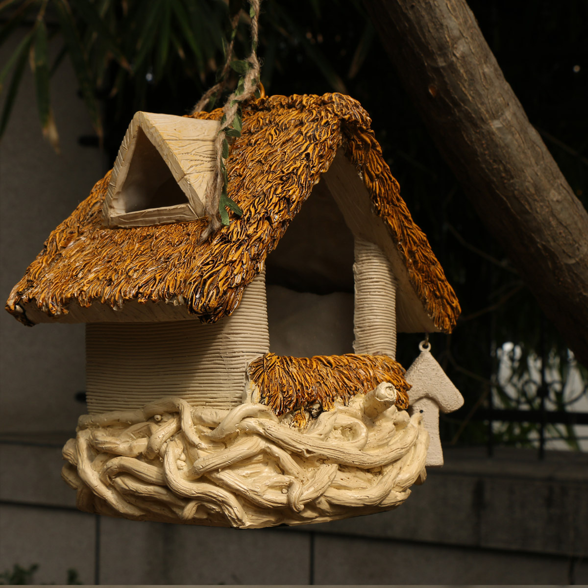 Decorative birdhouse hangers for the garden