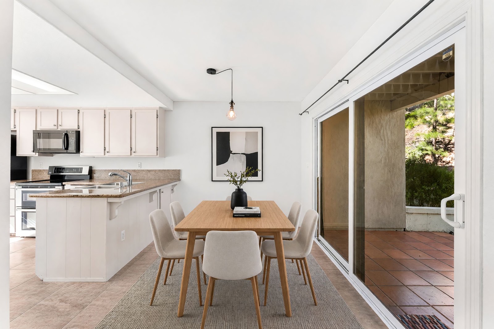 Dining area with slider to the private patio