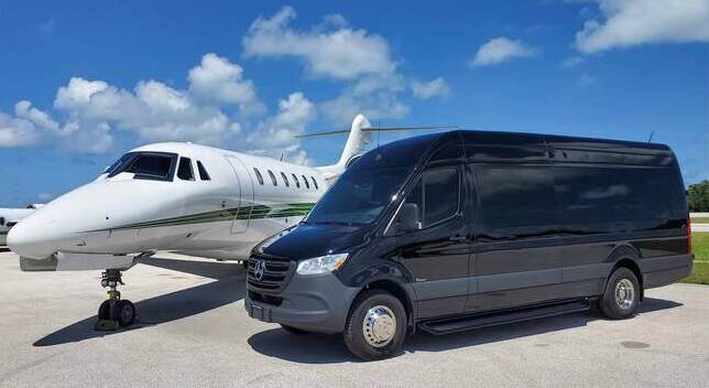 Vehicle waiting at the FBO for an arriving aircraft