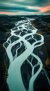 Glacial Braided River Delta in Black Volcanic Landscape