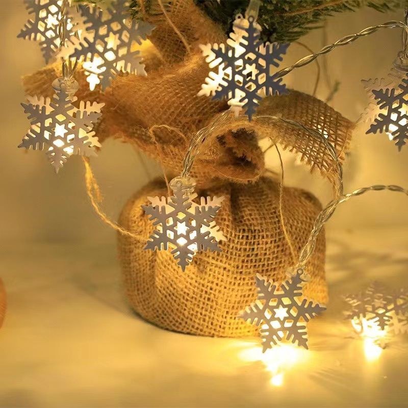 Decorative LED string lights with iron elements
