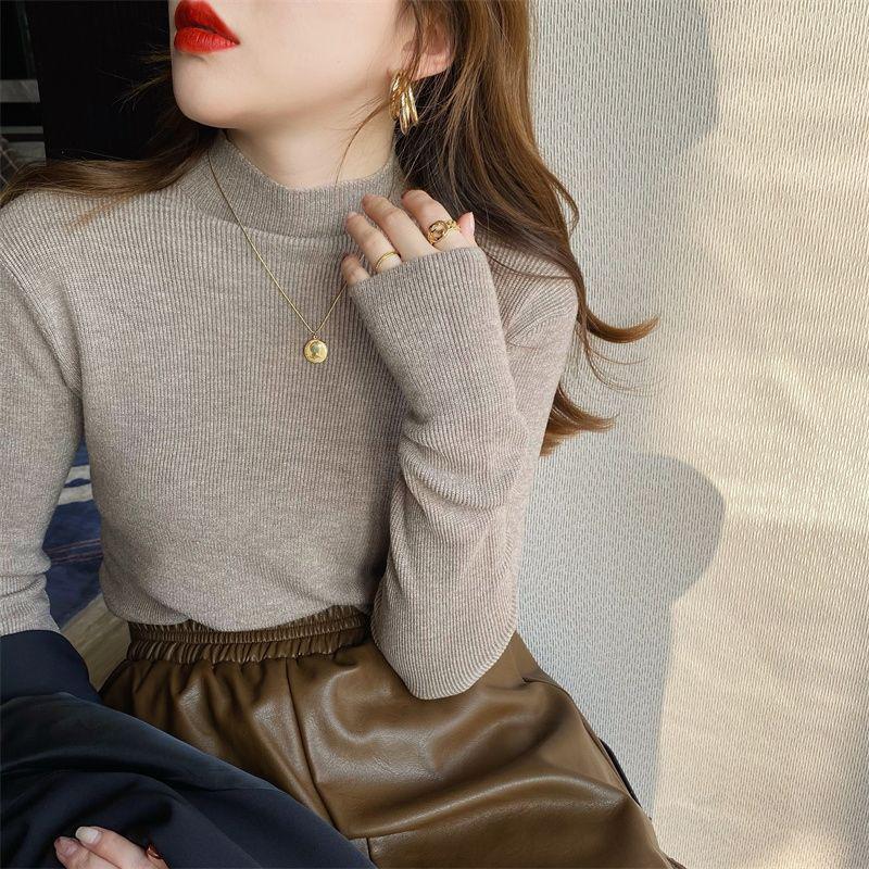 Women's knit sweater with stand-up collar, figure-hugging
