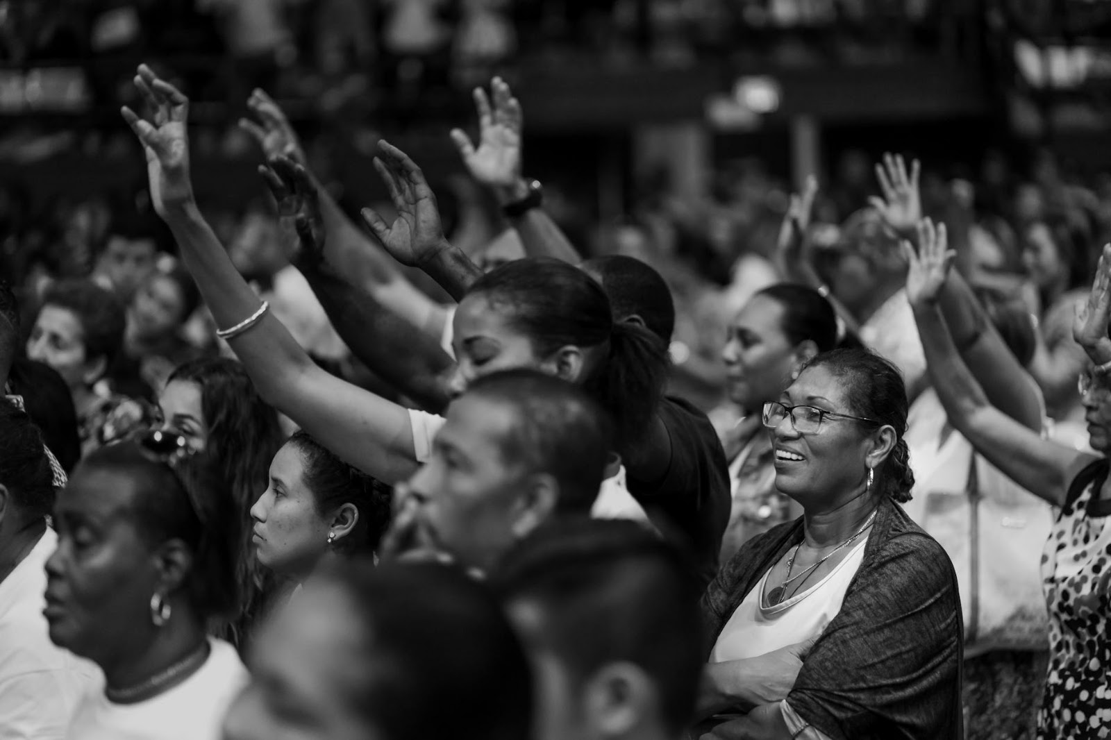 Diverse audience actively participating in an interactive livestream shopping trends event.