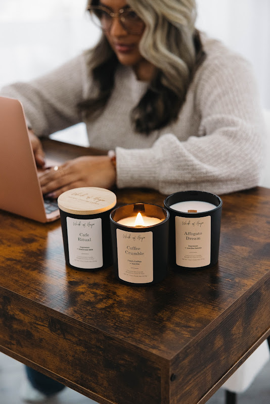 Woman relaxing on couch with Wick of Hope candle