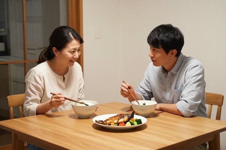 夕食を楽しむ日本の夫婦
