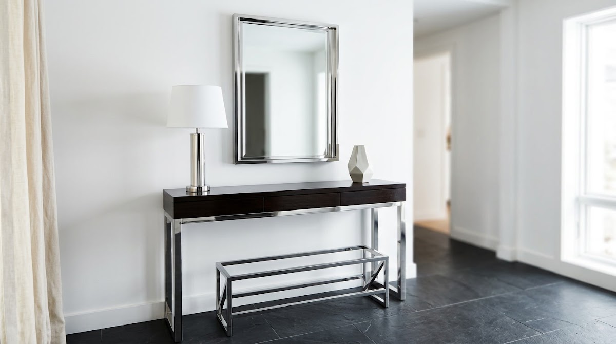 How to Fix the Most Common Chrome Decor Mistakes - chrome furniture balanced with walnut oak and layered textiles