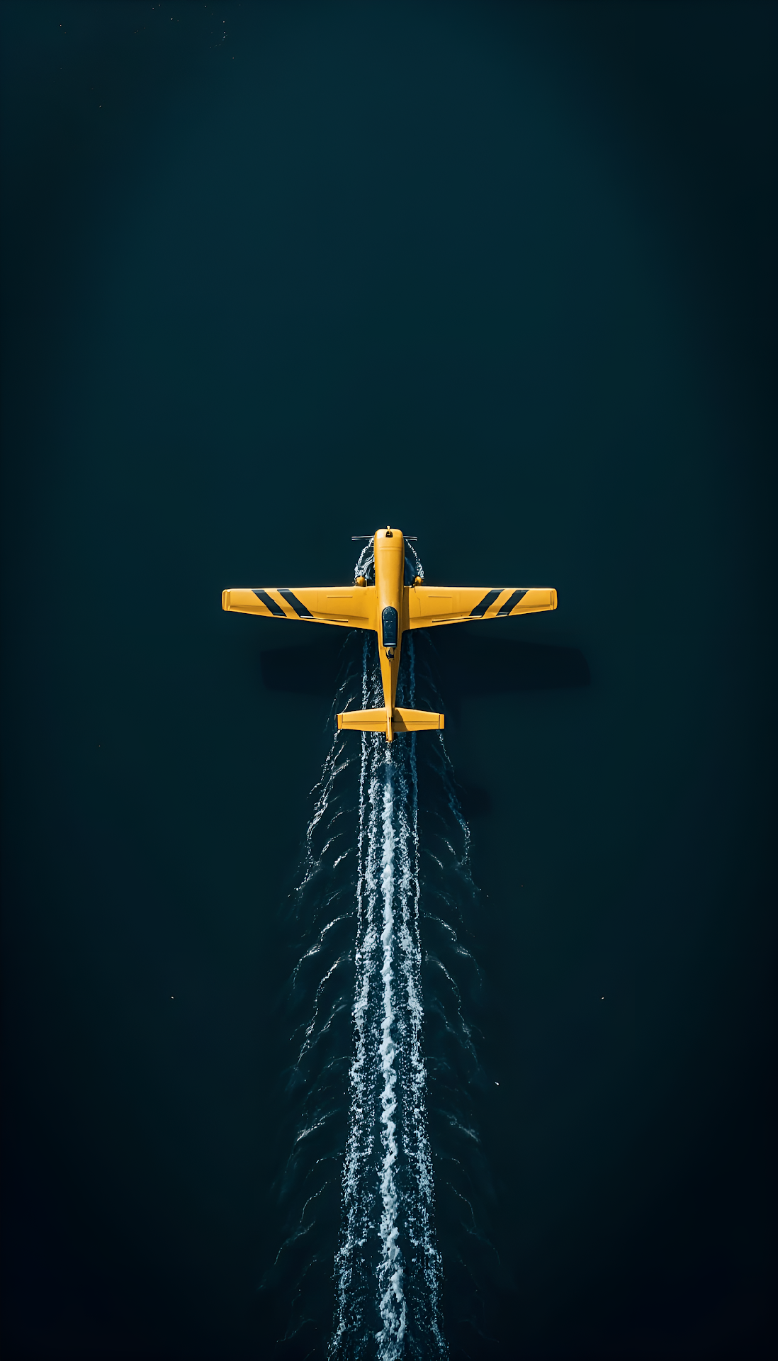 Top Down View Yellow Propeller Plane Skimming Dark Water - Free 4K mobile Wallpaper