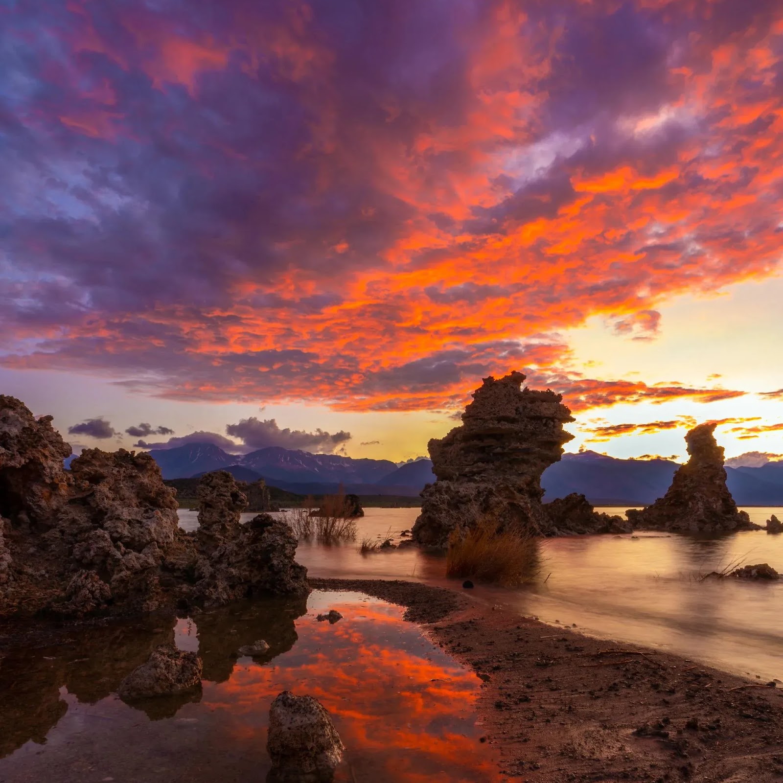 Download Fiery Sunset Over Lake Tufa Towers 2K iPhone
