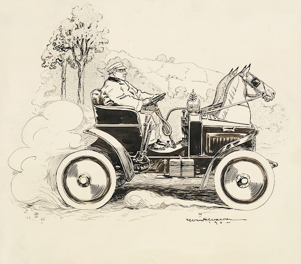 A man drives a car with two horse heads on the front to make it look more like a